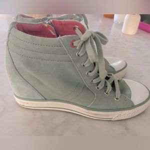 DKNY high top sneakers.  Excellent condition, very little wear.